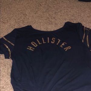 Navy blue and gold holister shirt